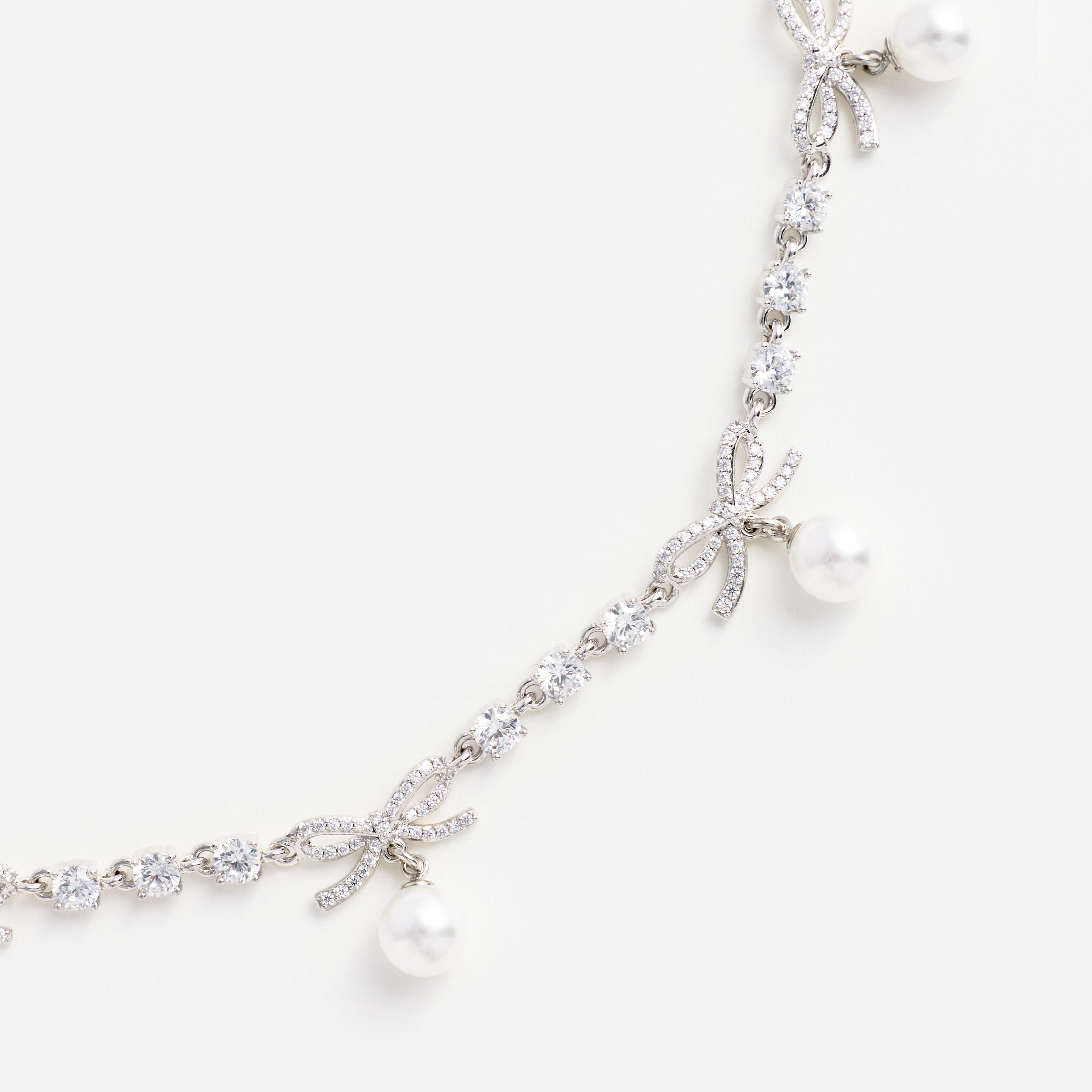 Crystal Bow Pearl Charm Necklace